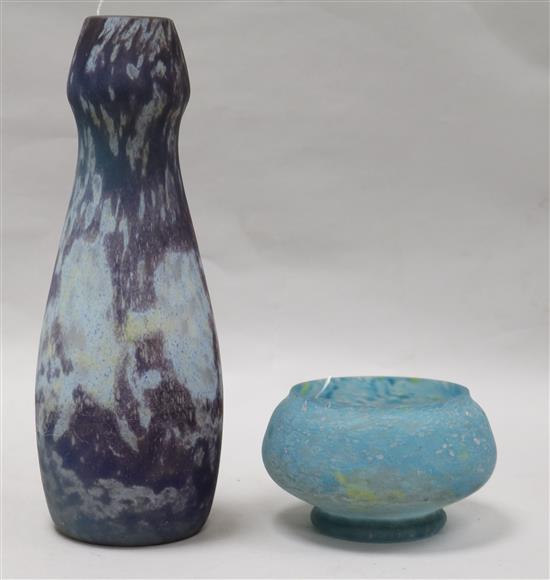 A modern blue/mauve ground tall glass vase, bears signature and a similar mottled blue circular footed vase (2) 29 & 8cm.